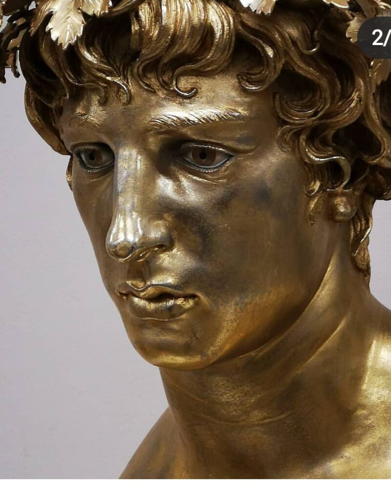 DECORATIVE GILDING ON BRASS SCULPTURE